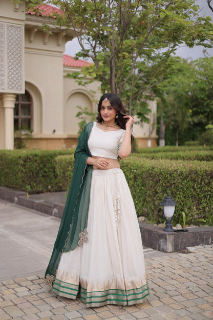 Comfortable and lightweight Elevate this Onam festive wardrobe with this elegant white Viscose jacquard lehenga choli with Dupatta set.