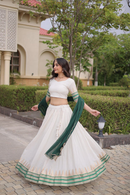 Comfortable and lightweight Elevate this Onam festive wardrobe with this elegant white Viscose jacquard lehenga choli with Dupatta set.