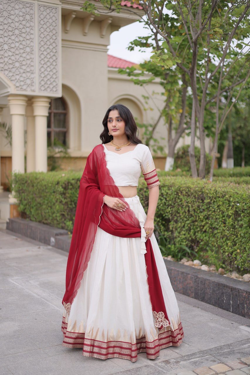 Comfortable and lightweight Elevate this Onam festive wardrobe with this elegant white Viscose jacquard lehenga choli with Dupatta set.