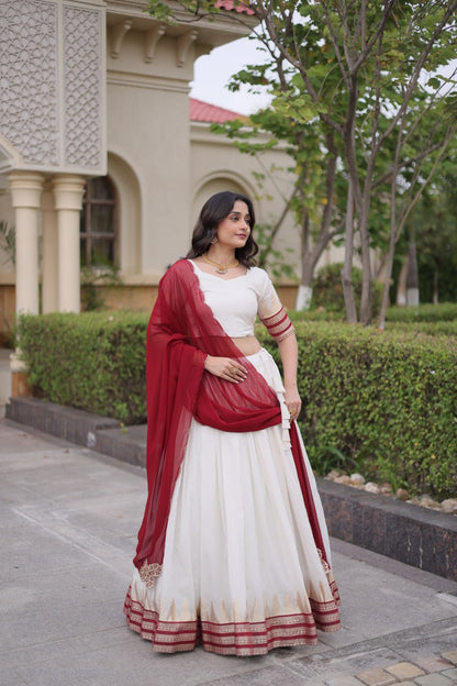 Comfortable and lightweight Elevate this Onam festive wardrobe with this elegant white Viscose jacquard lehenga choli with Dupatta set.