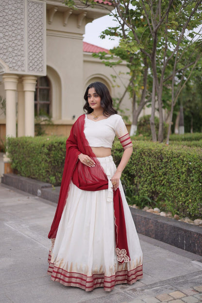 Comfortable and lightweight Elevate this Onam festive wardrobe with this elegant white Viscose jacquard lehenga choli with Dupatta set.