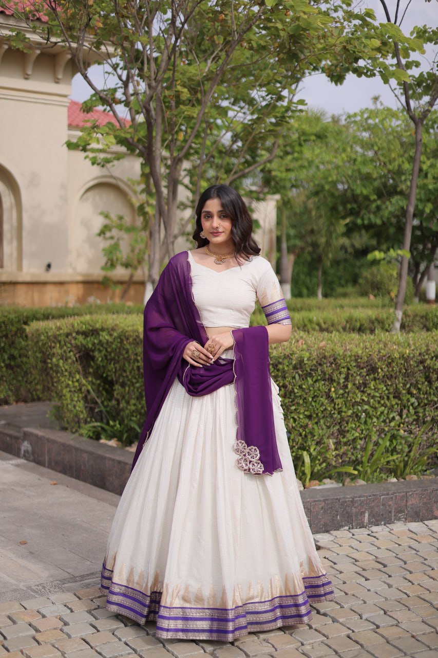 Comfortable and lightweight Elevate this Onam festive wardrobe with this elegant white Viscose jacquard lehenga choli with Dupatta set.