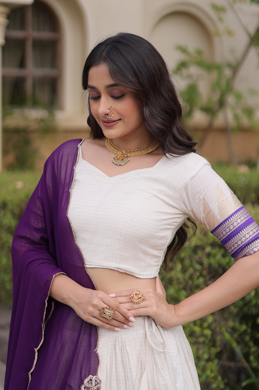 Comfortable and lightweight Elevate this Onam festive wardrobe with this elegant white Viscose jacquard lehenga choli with Dupatta set.